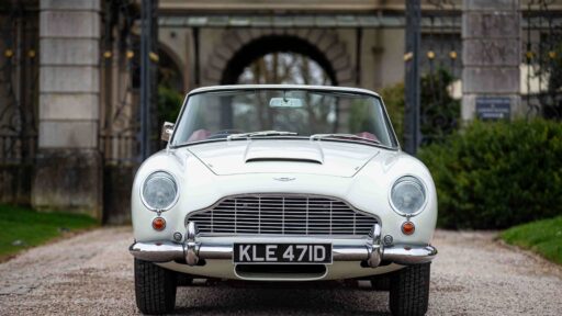 A rare 1965 Aston Martin DB5, one of 123 made, is up for auction. Known for its James Bond fame, this platinum convertible is estimated at over £800,000.