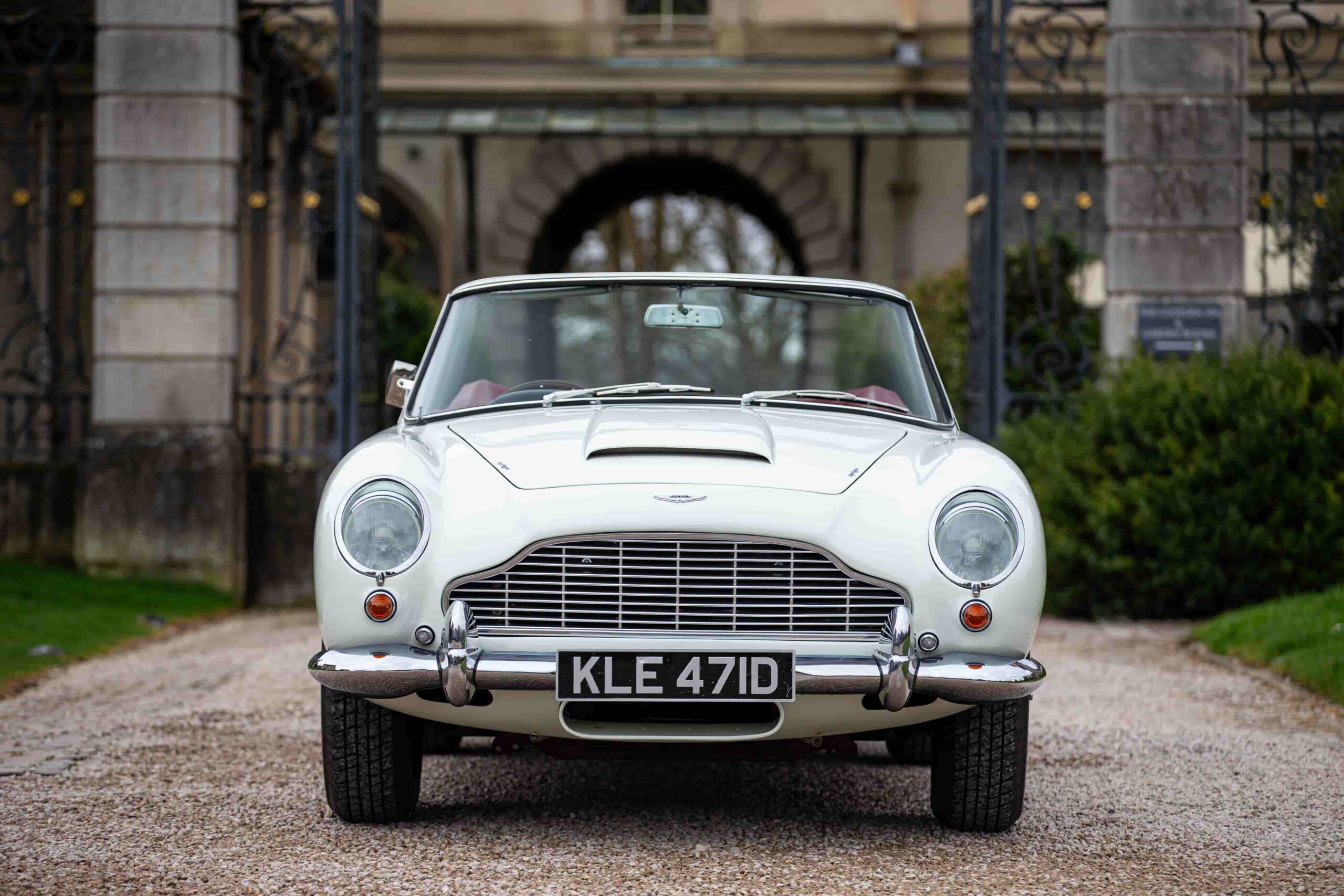 A rare 1965 Aston Martin DB5, one of 123 made, is up for auction. Known for its James Bond fame, this platinum convertible is estimated at over £800,000.