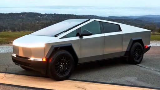 A futuristic Tesla Cyberbeast pickup truck, likened to the DeLorean, is debuting at auction. With a 0-60 mph in 2.68 seconds and a range of 340 miles, it's a collector's dream.