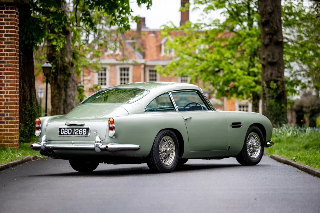An iconic 1964 Aston Martin DB5, known as James Bond's car in "Goldfinger" and "Thunderball," will be auctioned in Berkshire, expected to fetch between £425,000 and £475,000.