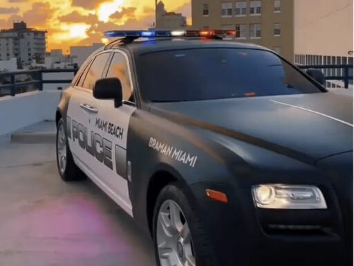 Miami Beach Police unveil a $110,000 Rolls-Royce Ghost for recruitment events, loaned by Braman Motors, sparking controversy over its extravagance and perceived insensitivity.