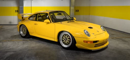 A 1996 Porsche 911 GT2 with just 30 miles on the odometer is set to be auctioned for £1.4 million. This vibrant Speed Yellow, 480 bhp car is a rare collector's gem.