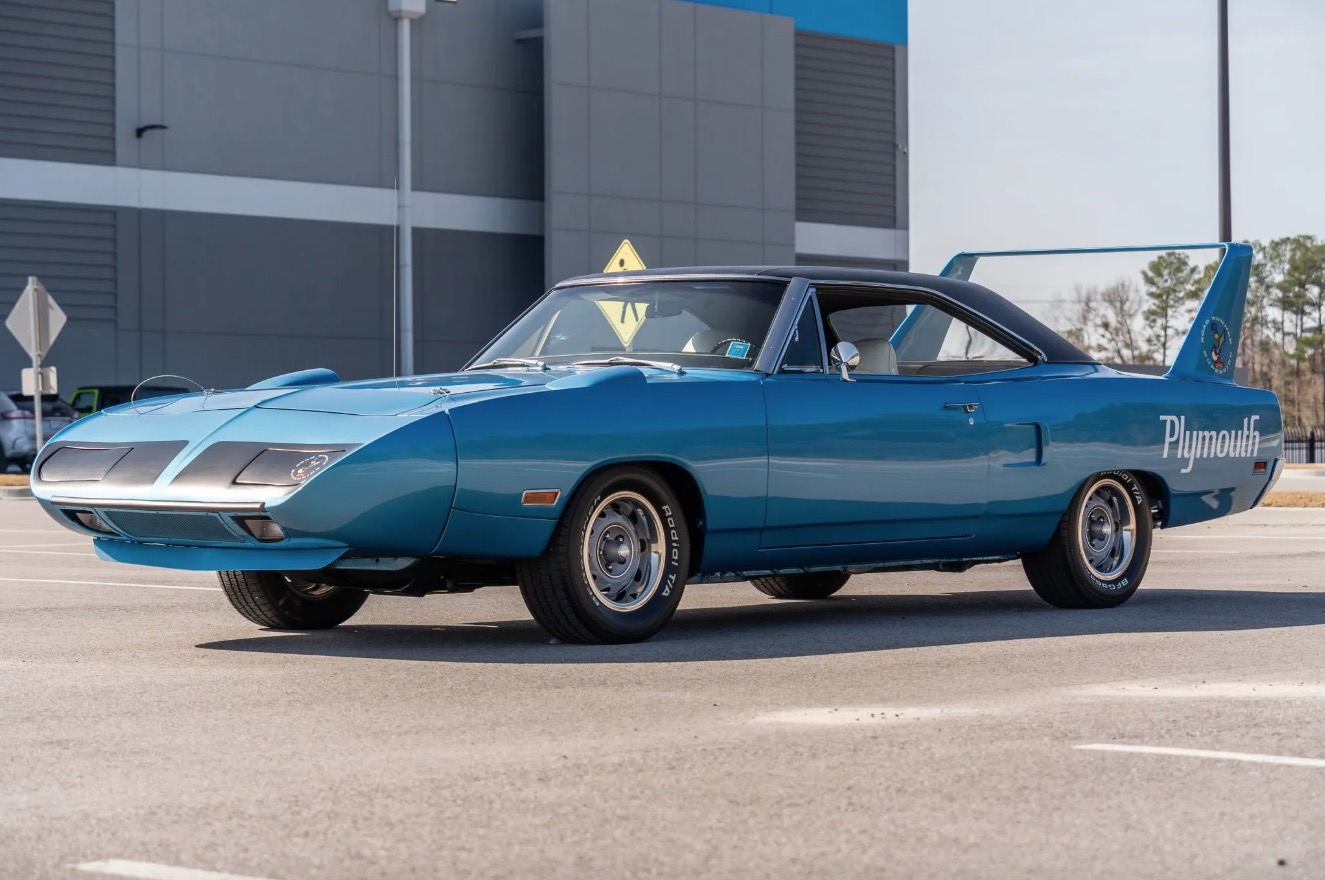 A rare 1970 Plymouth Superbird, featured in Disney Pixar's *Cars*, is up for auction at £147,000. One of only 2,000 made, this blue classic boasts a 4.4-liter V8 engine.