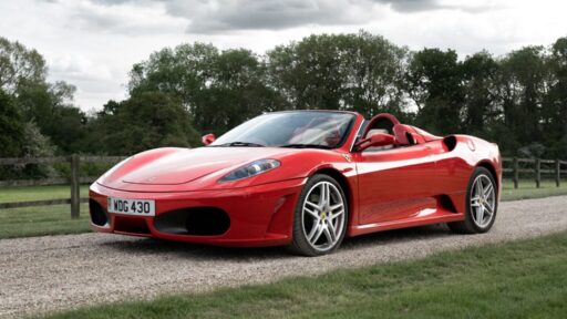 Robbie Savage's Ferrari F430 Spider, expected to sell for £80,000, was auctioned for just £54,000. The 2006 car has 26,000 miles, a top speed of 193 mph, and a valid MoT.