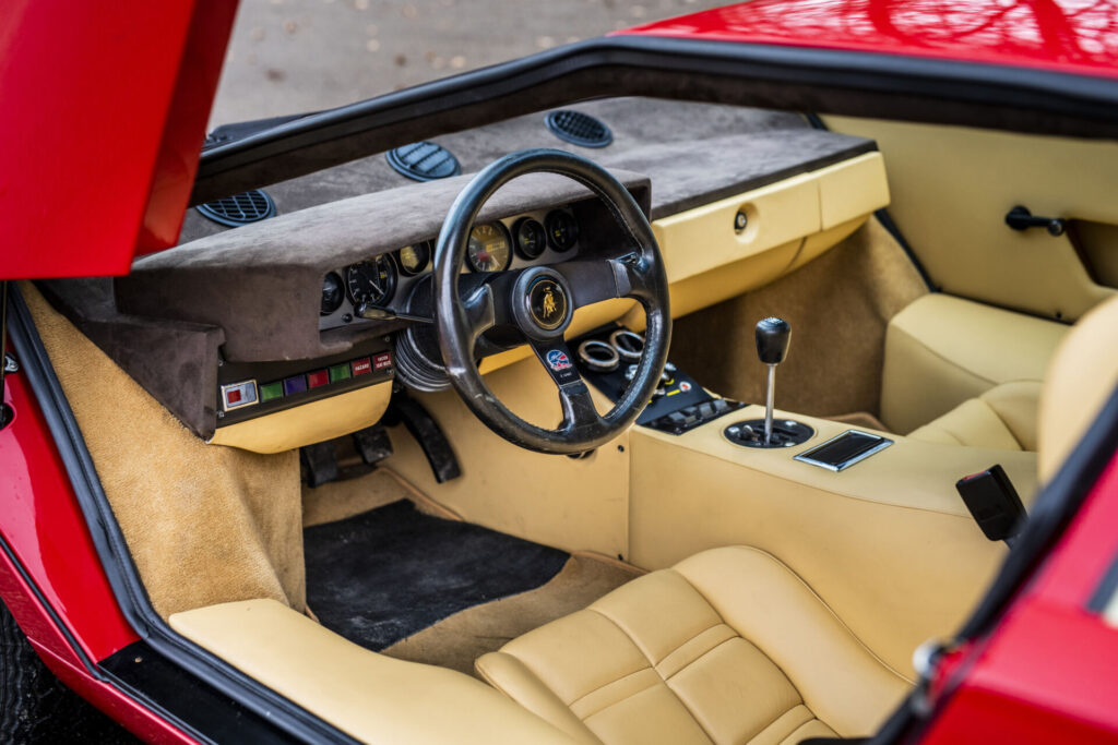 Rod Stewart’s 1977 Lamborghini Countach LP400, expected to sell for nearly £1 million, highlights an auction of 87 luxury cars, including a Bugatti Chiron and Ferrari Enzo.