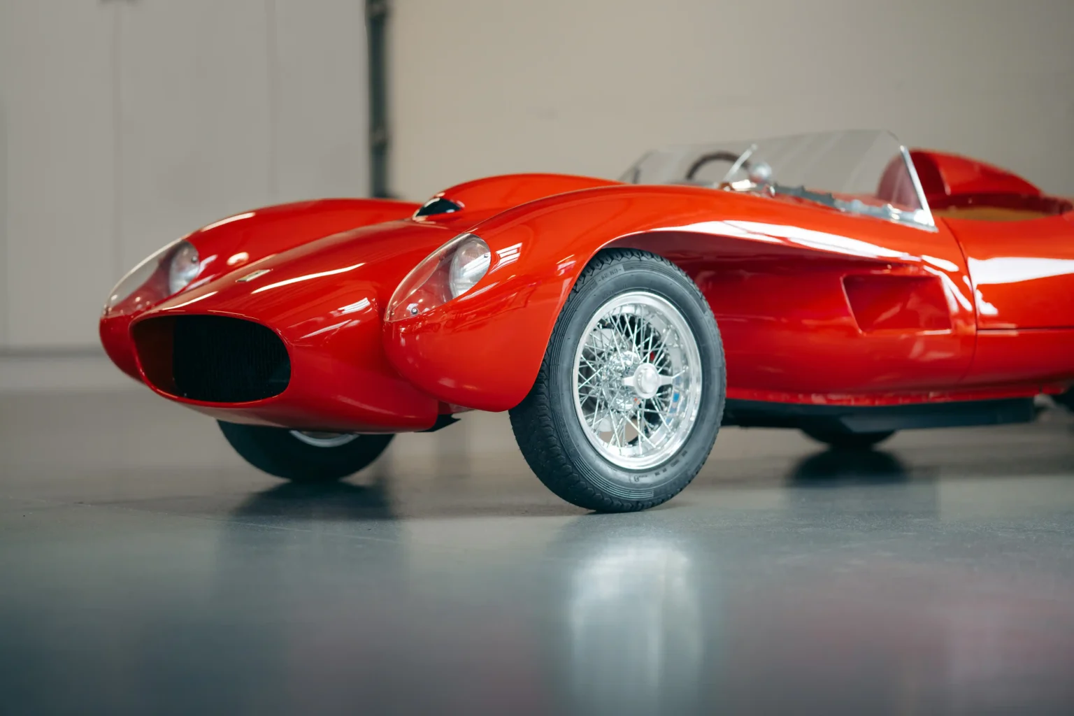 The ultimate toy car, a Ferrari Testa Rossa J, is on sale at Harrods for Christmas at £96,000. This battery-powered mini sports car reaches up to 50mph and is a collector's dream.
