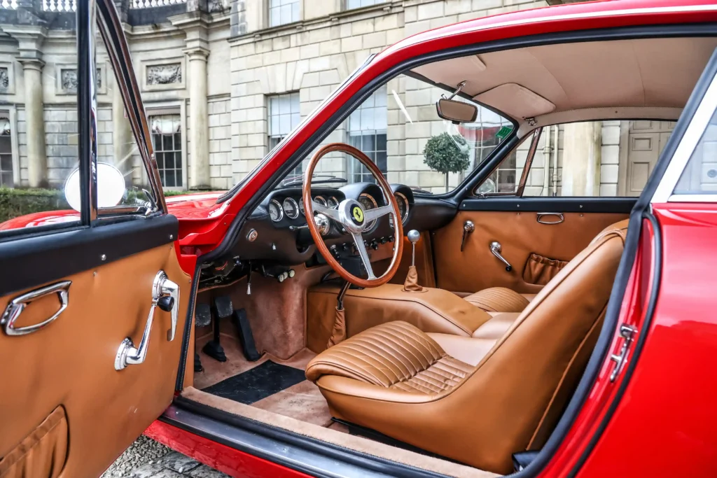 A vintage 1964 Ferrari 250 GT/L Berlinetta Lusso, once owned by Chris Evans, is set to sell for £1.5 million. This rare classic has been meticulously restored and maintained.