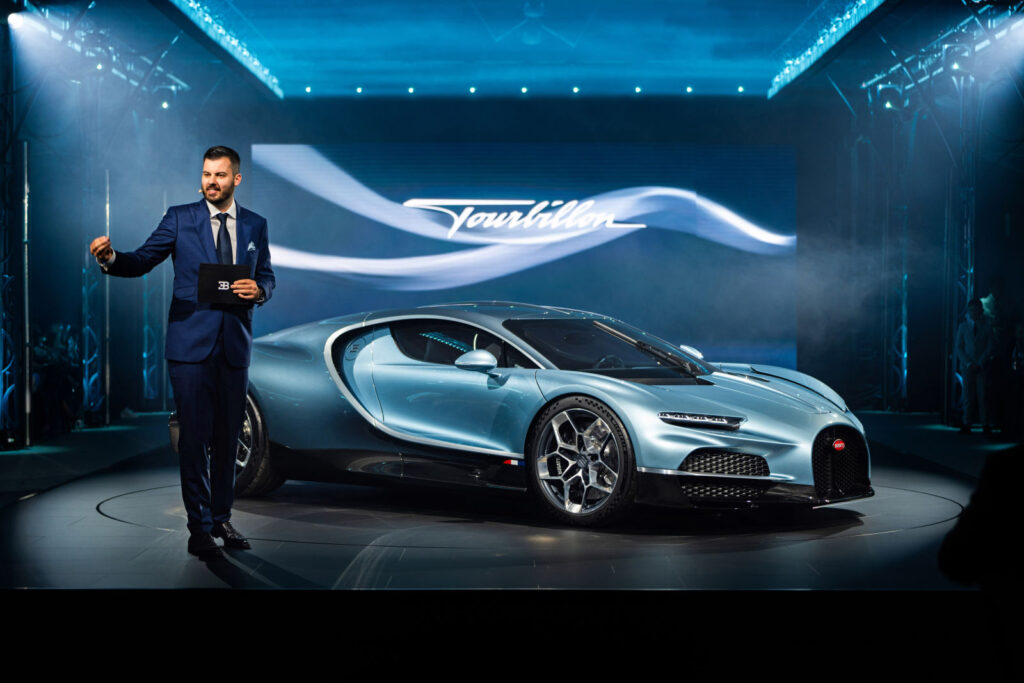 Celebrate 115 years of Bugatti with the unveiling of the Tourbillon at the historic 'La Grande Première' in Molsheim, marking a new era in luxury automotive innovation.