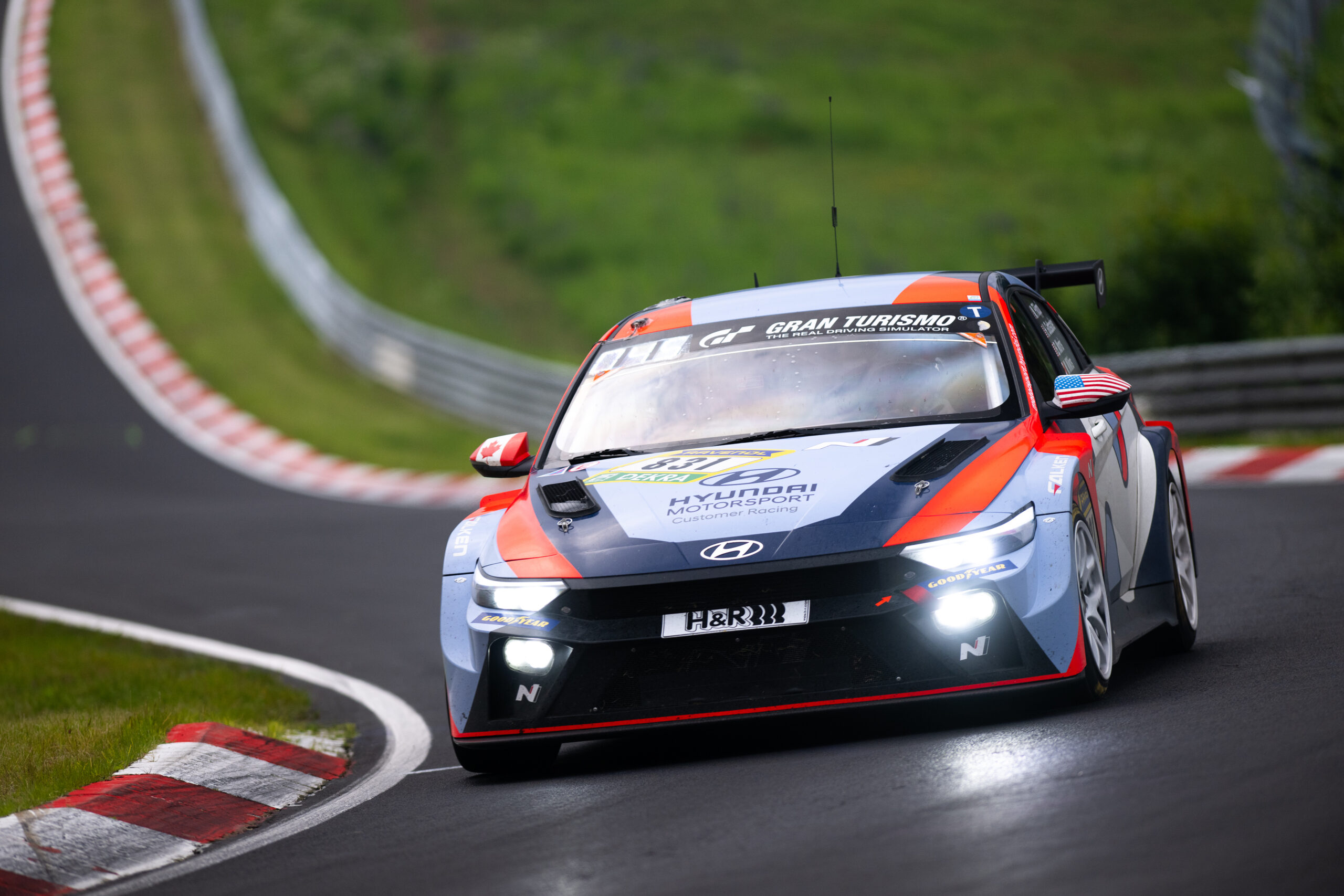 The Hyundai Elantra N TCR secured its fourth consecutive TCR class victory at the Nürburgring 24 Hours, overcoming severe fog and a 14-hour red flag, achieving a historic 1-2-3 finish.