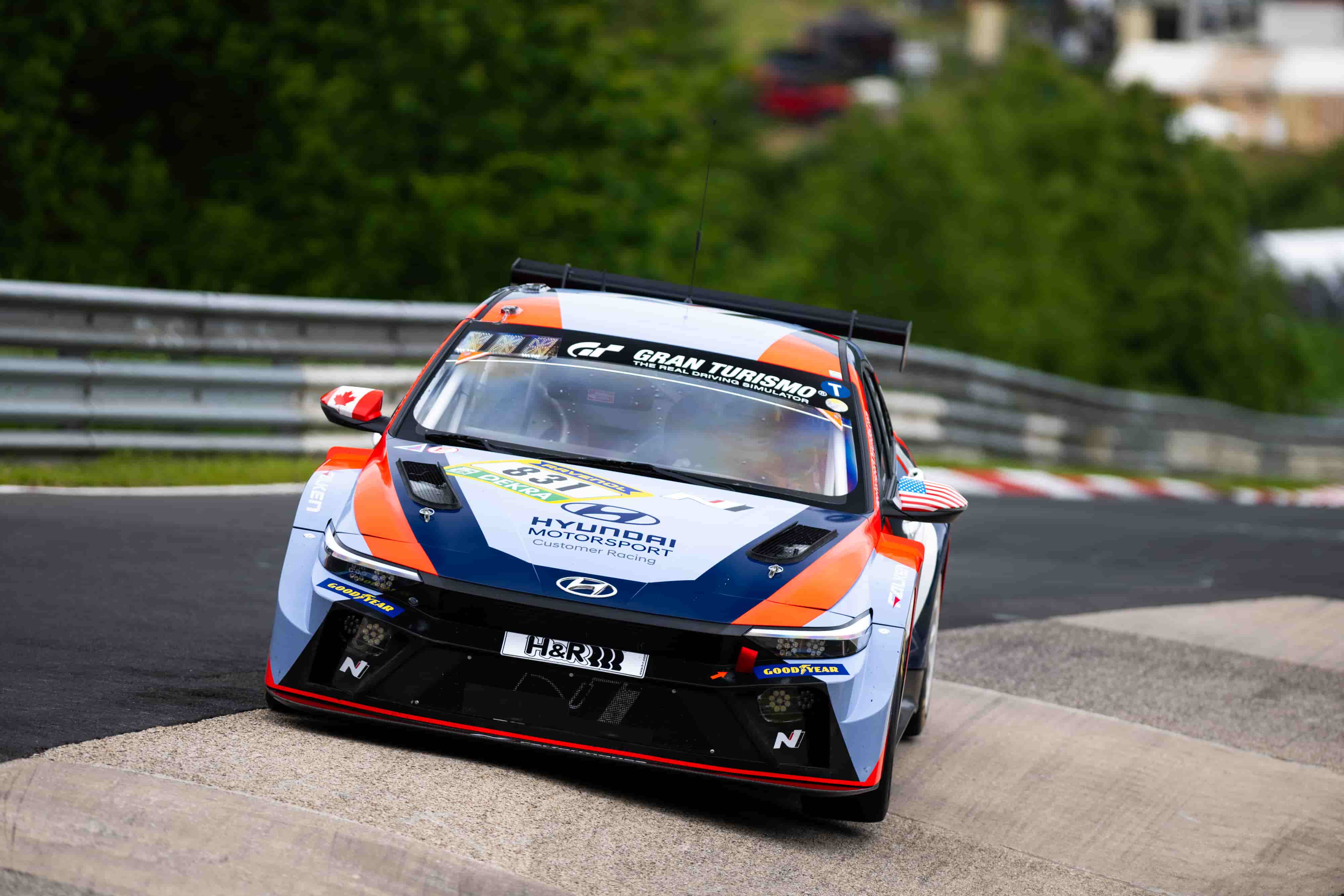 The Hyundai Elantra N TCR secured its fourth consecutive TCR class victory at the Nürburgring 24 Hours, overcoming severe fog and a 14-hour red flag, achieving a historic 1-2-3 finish.