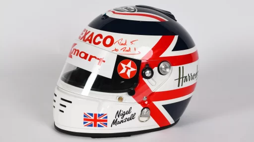 Nigel Mansell's F1 memorabilia auction fetched £54,764, less than half the estimated £117,000. Highlights included a £5,040 photo with Senna, Prost, and Piquet.