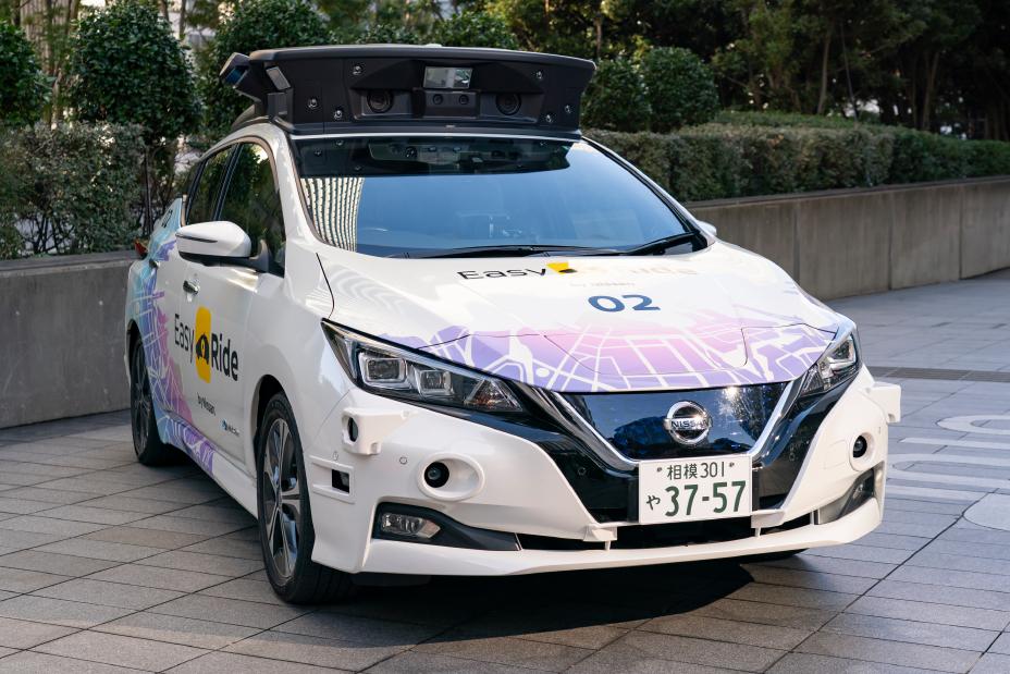 Nissan showcases a prototype with advanced autonomous drive technologies, aiming for autonomous mobility services by 2027, demonstrating on busy Yokohama streets.