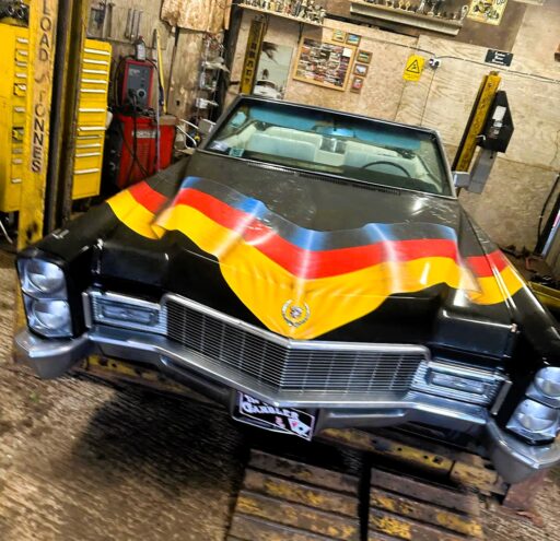 YouTuber Sam Hard restores Snoop Dogg's iconic 1966 Cadillac Deville, planning to reunite it with the rapper in Paris for the 2024 Summer Olympics. Watch the journey on YouTube.