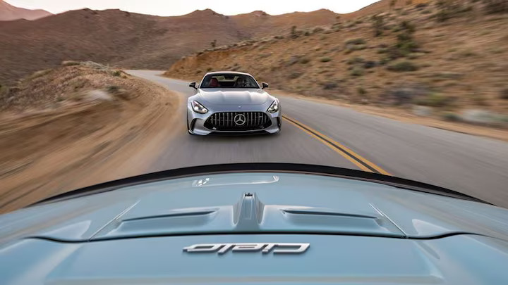 The 2023 Maserati MC20 Cielo and 2024 Mercedes-AMG GT63 battle for grand tourer supremacy, with Maserati's sleek design and AMG's superior performance and practicality.