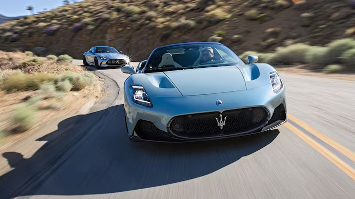 The 2023 Maserati MC20 Cielo and 2024 Mercedes-AMG GT63 battle for grand tourer supremacy, with Maserati's sleek design and AMG's superior performance and practicality.