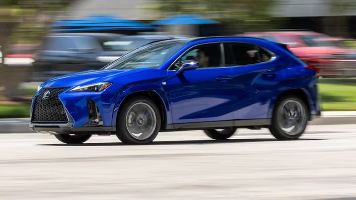 The 2025 Lexus UX Hybrid boasts a new lithium-ion battery, modern infotainment system, and up to 44 mpg. However, it faces high prices for top trims and a compact cabin.