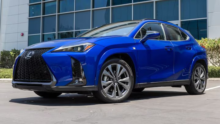 The 2025 Lexus UX Hybrid boasts a new lithium-ion battery, modern infotainment system, and up to 44 mpg. However, it faces high prices for top trims and a compact cabin.