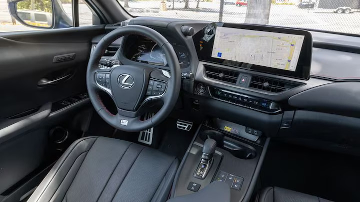 The 2025 Lexus UX Hybrid boasts a new lithium-ion battery, modern infotainment system, and up to 44 mpg. However, it faces high prices for top trims and a compact cabin.