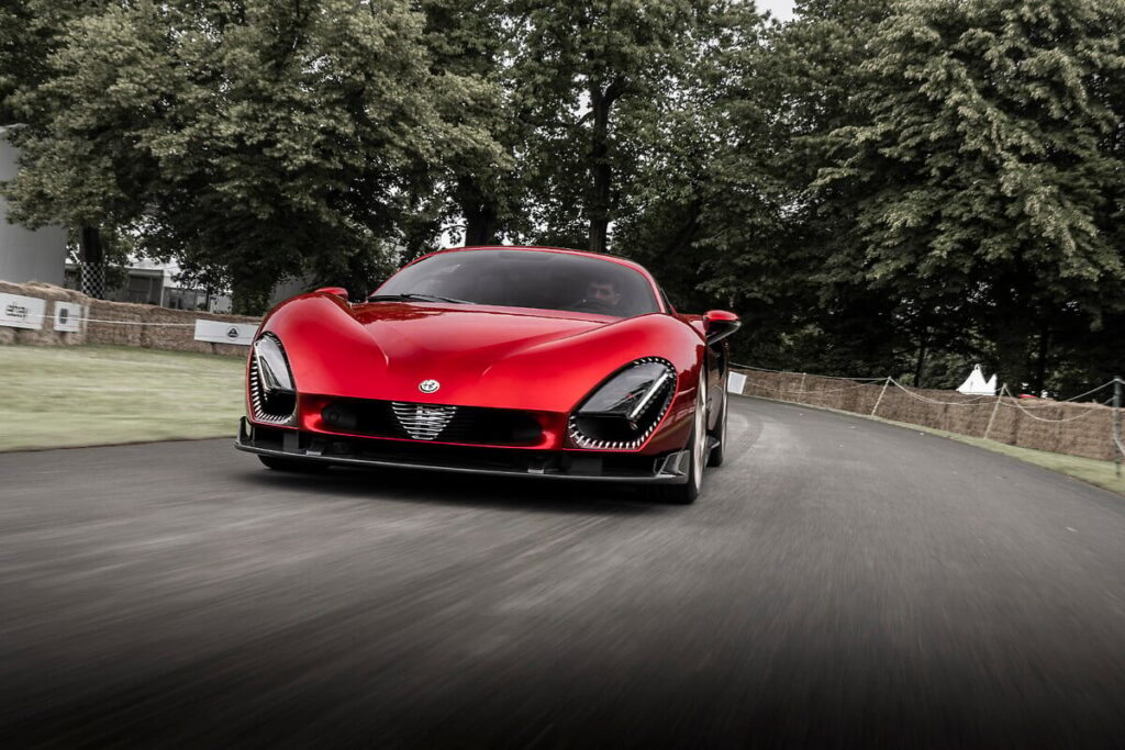 The Alfa Romeo 33 Stradale and electric Alfa Romeo Junior debut at the Goodwood Festival of Speed, showcasing heritage and innovation in the "Supercar Paddock" and "Electric Avenue" sections.