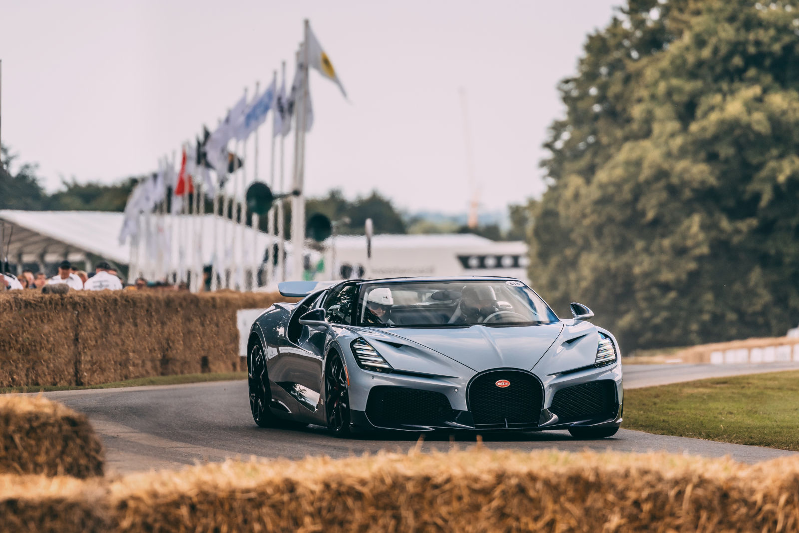 Bugatti captivated audiences at Goodwood Festival of Speed 2024 with the debut of the Tourbillon and thrilling displays by the W16 Mistral and Bolide, showcasing their motorsport legacy.