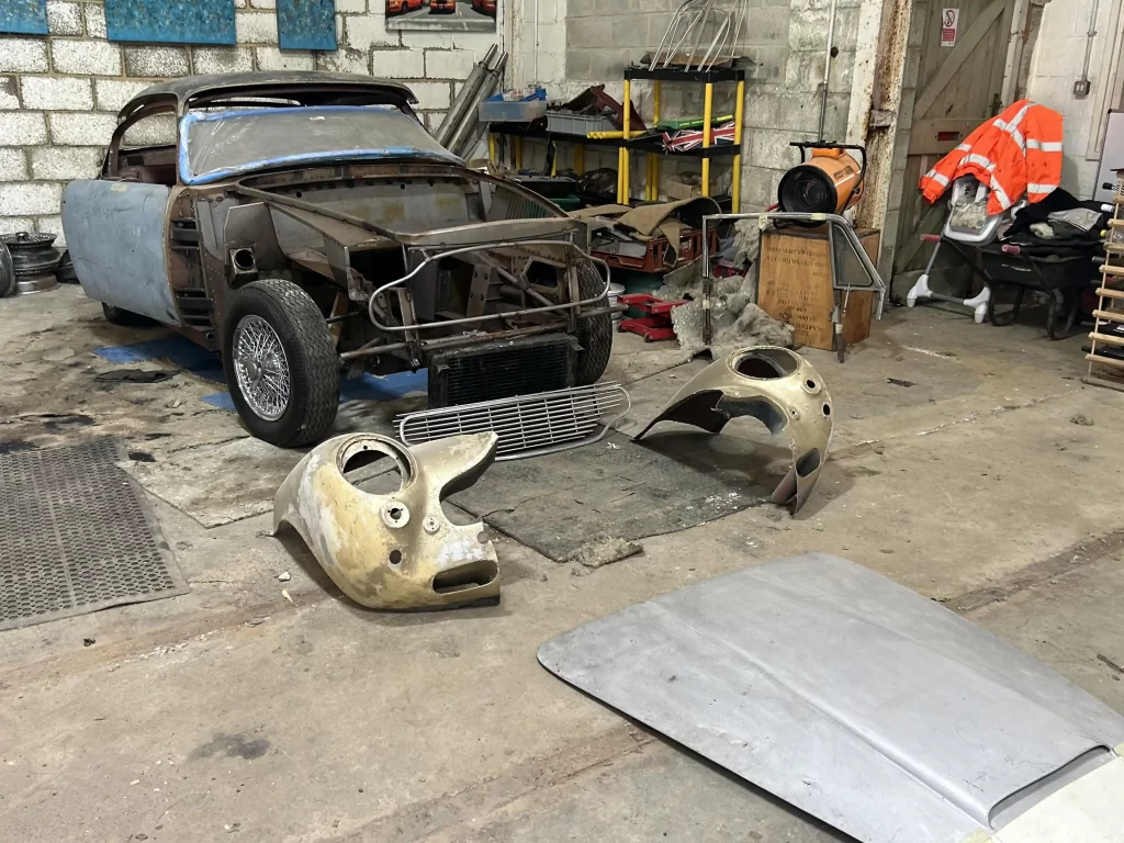 A 1967 Aston Martin DB6, a stalled restoration project, sold for £76,500 at auction. Despite its corroded bodywork, it's a unique opportunity for a classic car enthusiast.