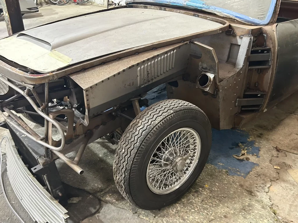 A 1967 Aston Martin DB6, a stalled restoration project, sold for £76,500 at auction. Despite its corroded bodywork, it's a unique opportunity for a classic car enthusiast.