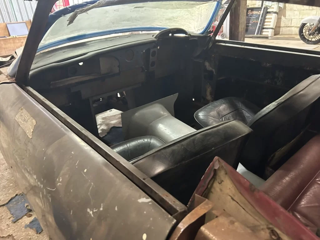 A 1967 Aston Martin DB6, a stalled restoration project, sold for £76,500 at auction. Despite its corroded bodywork, it's a unique opportunity for a classic car enthusiast.