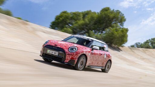 The MINI John Cooper Works E Prototype, the first electric model in the lineup, debuted at the Goodwood Festival of Speed, showcasing MINI's innovation and commitment to electromobility with advanced design and technology.