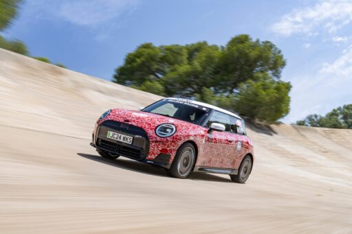 The MINI John Cooper Works E Prototype, the first electric model in the lineup, debuted at the Goodwood Festival of Speed, showcasing MINI's innovation and commitment to electromobility with advanced design and technology.