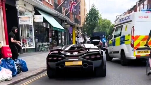 Driver of a £3M Lamborghini Sian gets instant karma after revving engine next to police van in South Kensington. Met Police promptly pull over the foolish motorist. Caught on video.