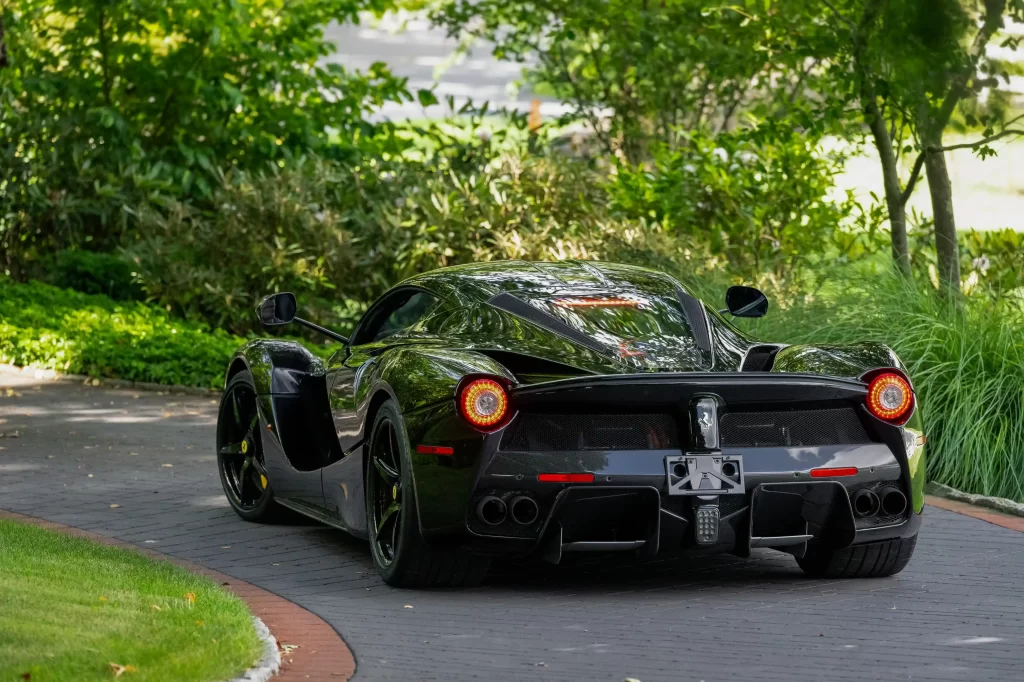 A rare black LaFerrari, the first hybrid road car by Ferrari, is for sale at £3.1 million. With under 5,000 miles, it boasts a 6.2L V-12 engine and a 120-kW electric motor.