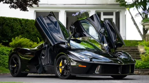 A rare black LaFerrari, the first hybrid road car by Ferrari, is for sale at £3.1 million. With under 5,000 miles, it boasts a 6.2L V-12 engine and a 120-kW electric motor.