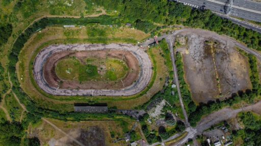 Explorer Chloe Urbex discovers an abandoned Essex racetrack reclaimed by nature, sparking nostalgic memories among locals. See photos and reactions to this hidden gem.