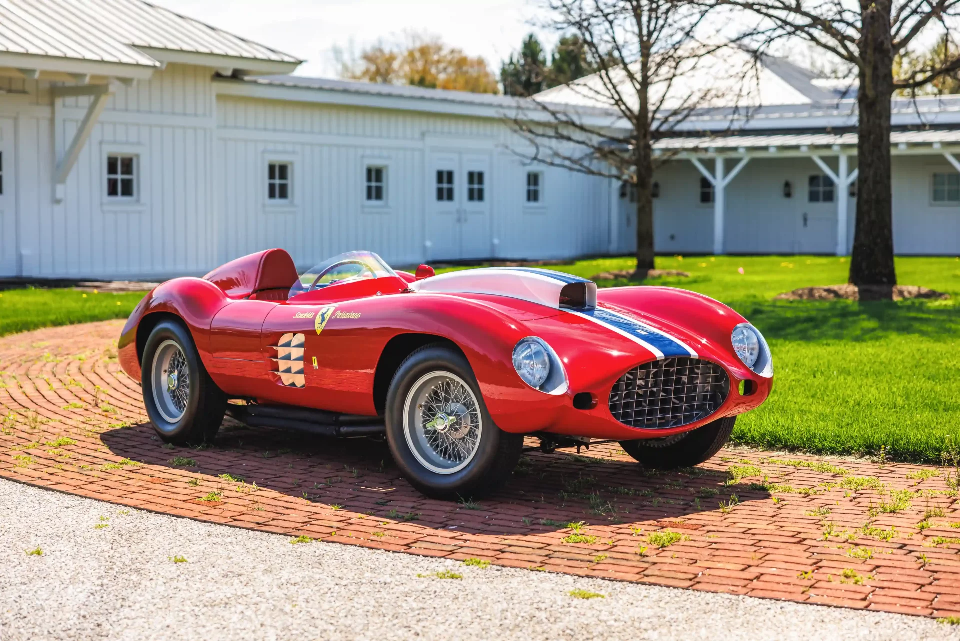 A super rare 1955 Ferrari 410 Sport Spider, driven by Carroll Shelby, is set to sell for £11.5 million at auction. This one-of-four classic car boasts custom features and a rich racing history.