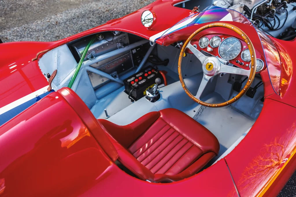 A super rare 1955 Ferrari 410 Sport Spider, driven by Carroll Shelby, is set to sell for £11.5 million at auction. This one-of-four classic car boasts custom features and a rich racing history.