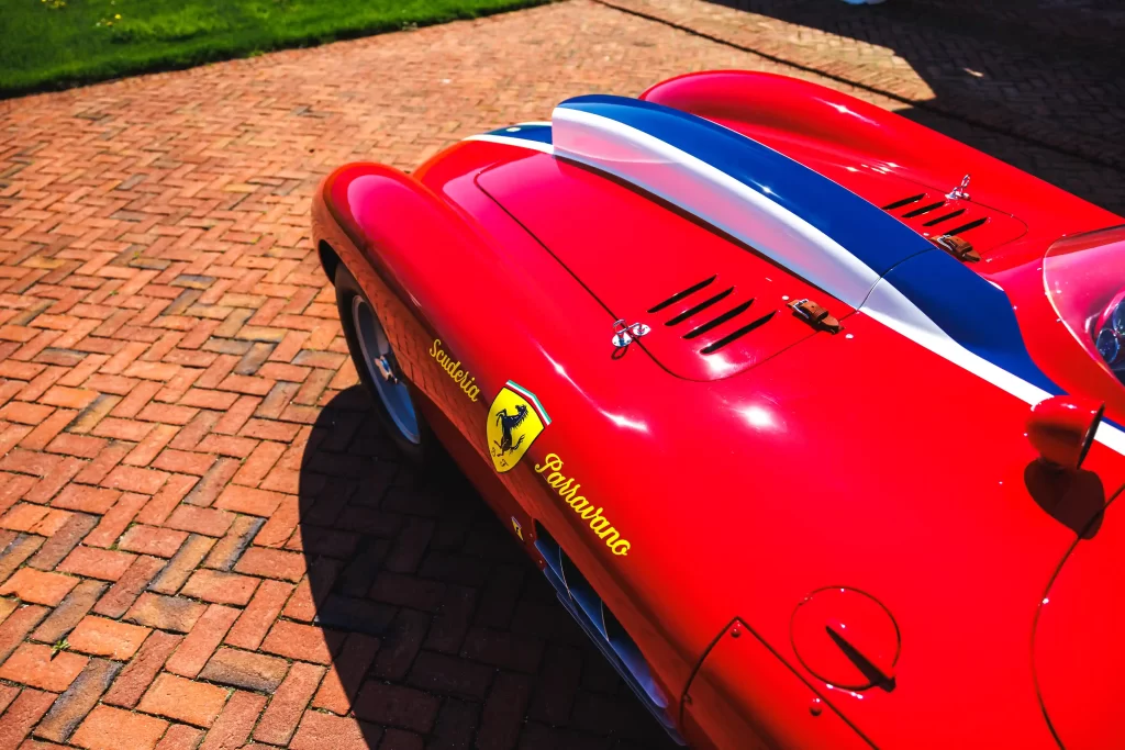 A super rare 1955 Ferrari 410 Sport Spider, driven by Carroll Shelby, is set to sell for £11.5 million at auction. This one-of-four classic car boasts custom features and a rich racing history.