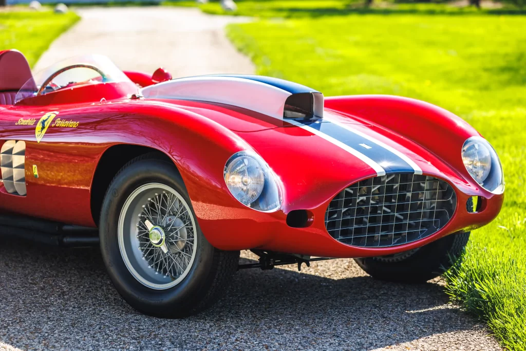 A super rare 1955 Ferrari 410 Sport Spider, driven by Carroll Shelby, is set to sell for £11.5 million at auction. This one-of-four classic car boasts custom features and a rich racing history.