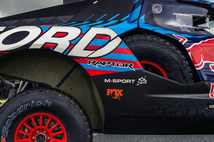 Ford Performance debuts the Raptor T1+ at Goodwood Festival of Speed, designed for the Dakar Rally with advanced suspension, a powerful V8 engine, and rugged off-road capabilities.