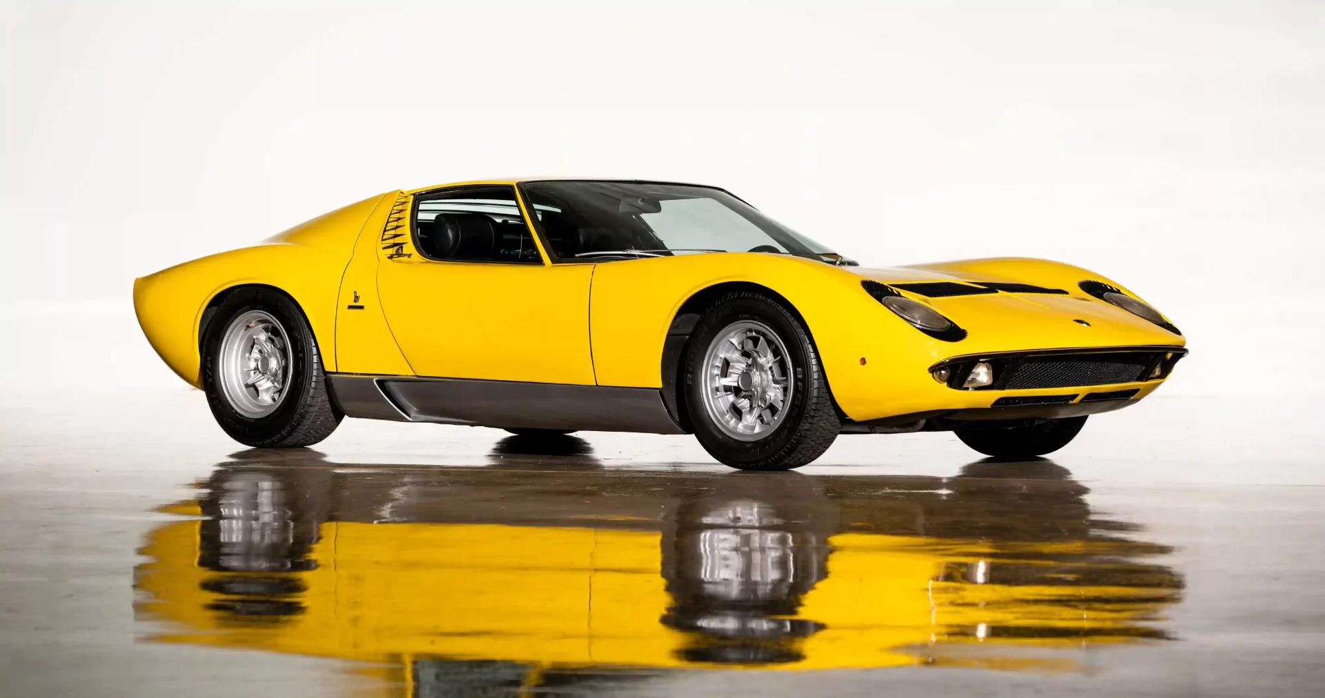 Iconic Lamborghini Miura, the first modern supercar, hits the auction block for £1.2M! Own a piece of motoring history with 0-60mph in 5.5s and a top speed of 168mph.