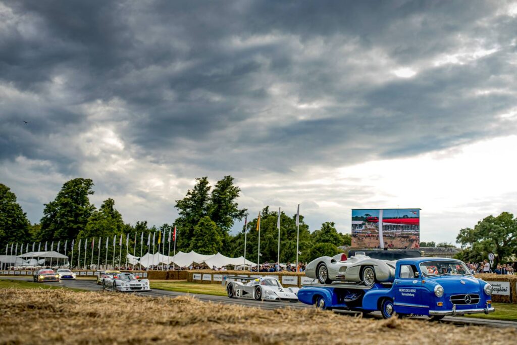 Mercedes-Benz celebrated 130 years of motorsport history at the Goodwood Festival of Speed 2024 with a spectacular parade, featuring iconic vehicles like the W 25, C 11, CLK LM, and the "Blue Wonder."