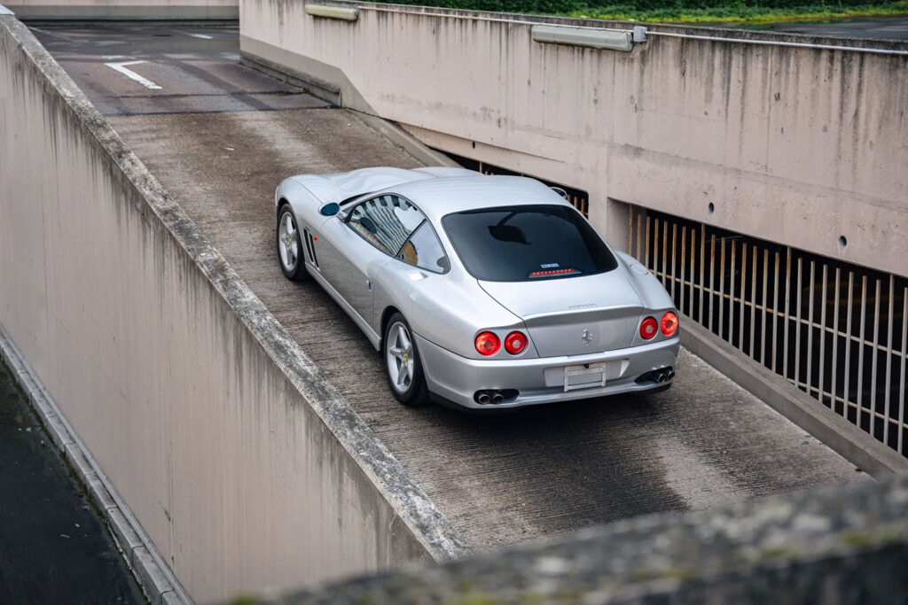 Michael Schumacher's 1996 Ferrari 550 Maranello, signed by the legend himself, is up for auction at £350,000. This rare car boasts a 5.5L V12 engine and low mileage.