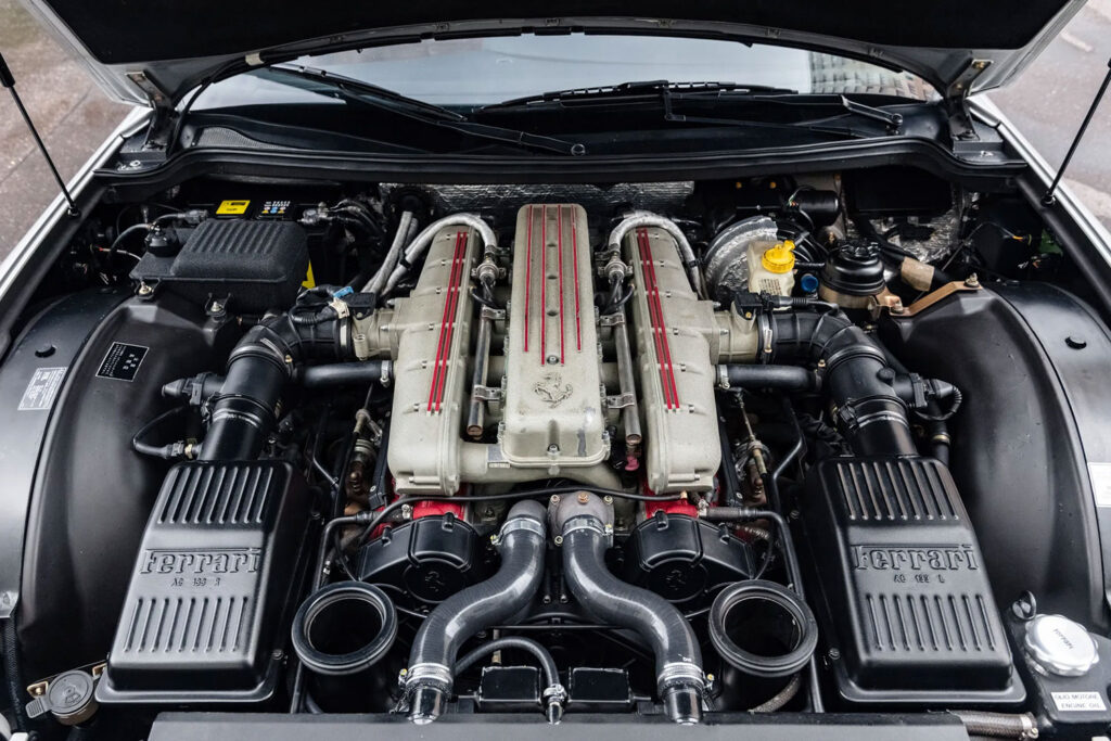 Michael Schumacher's 1996 Ferrari 550 Maranello, signed by the legend himself, is up for auction at £350,000. This rare car boasts a 5.5L V12 engine and low mileage.