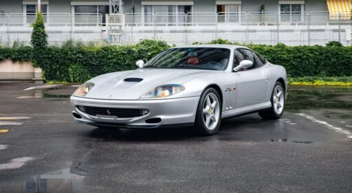 Michael Schumacher's 1996 Ferrari 550 Maranello, signed by the legend himself, is up for auction at £350,000. This rare car boasts a 5.5L V12 engine and low mileage.