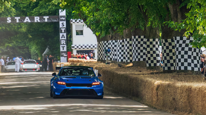 Ford Mustang GTD showcases its power at Goodwood Festival of Speed, roaring up the hill in patriotic defiance. With customizable colors and unmatched performance, freedom intensifies.