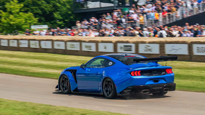 Ford Mustang GTD showcases its power at Goodwood Festival of Speed, roaring up the hill in patriotic defiance. With customizable colors and unmatched performance, freedom intensifies.