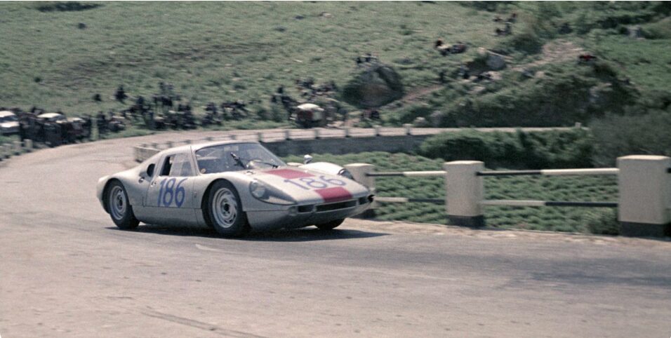 Ben Weinberger, Porsche's spokesperson, honors the 60th anniversary of the 904 Carrera GTS's Targa Florio victory, driving two Cayenne GTS models through the historic Sicilian rally route.