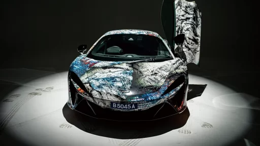 The "ROARING INTO THE FUTURE" exhibition at McLaren Showroom in Kuala Lumpur showcased a collaboration between McLaren, Jaee Tee, and Mitsuhiro Higuchi, celebrating the Tiger's courage and McLaren's legacy.