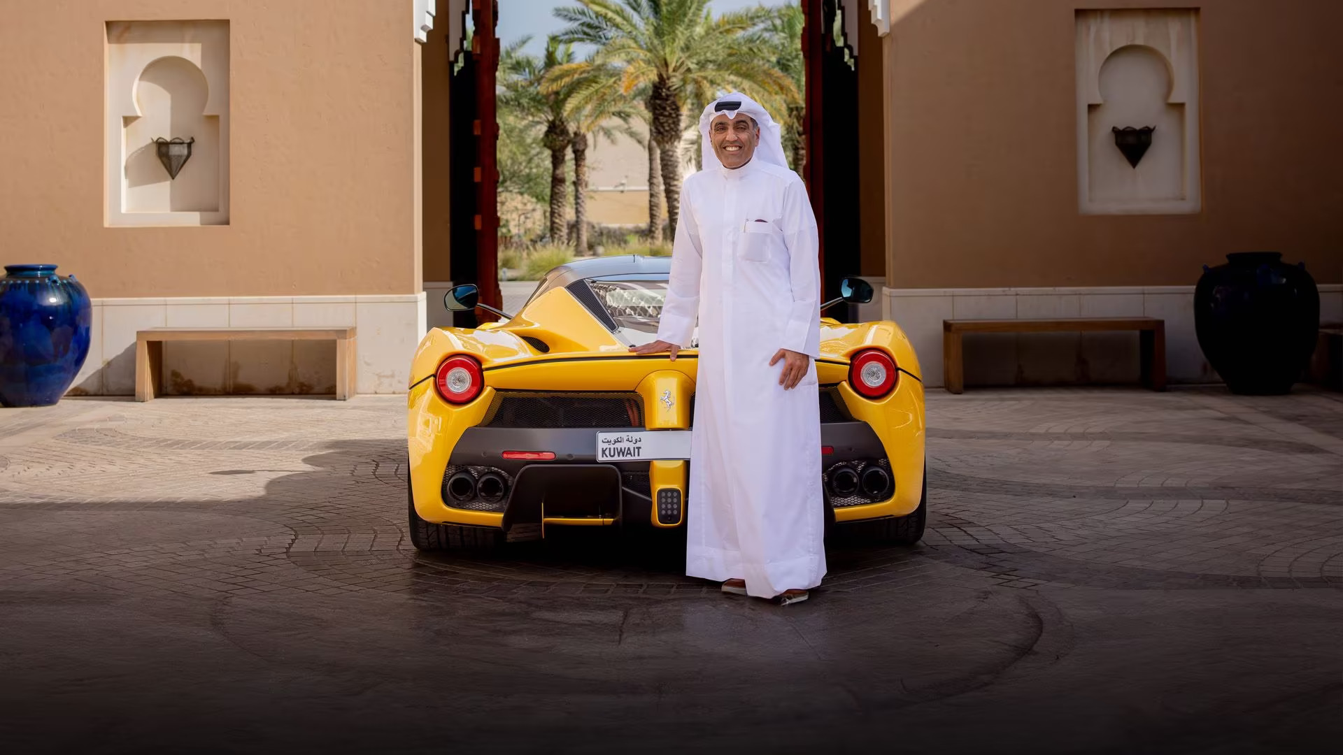 Meshal Al Marzouq's Ferrari passion began in the 1980s with a blue Ferrari 412 gift. Now, he owns around a dozen Ferraris, cherishing the V12 for its unique sound and power.