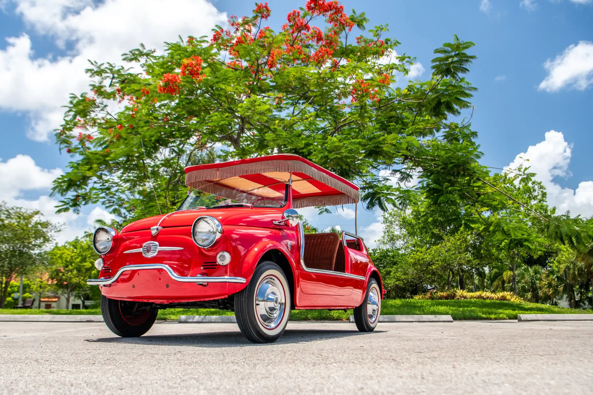 Rare 1959 Fiat 500 Jolly with just 6,313 miles and a quirky surrey top is up for sale at £78,000. Perfect for beach lovers, this iconic model offers timeless seaside charm.