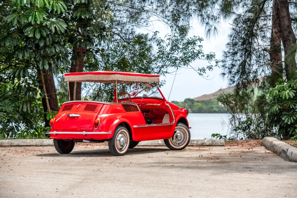 Rare 1959 Fiat 500 Jolly with just 6,313 miles and a quirky surrey top is up for sale at £78,000. Perfect for beach lovers, this iconic model offers timeless seaside charm.